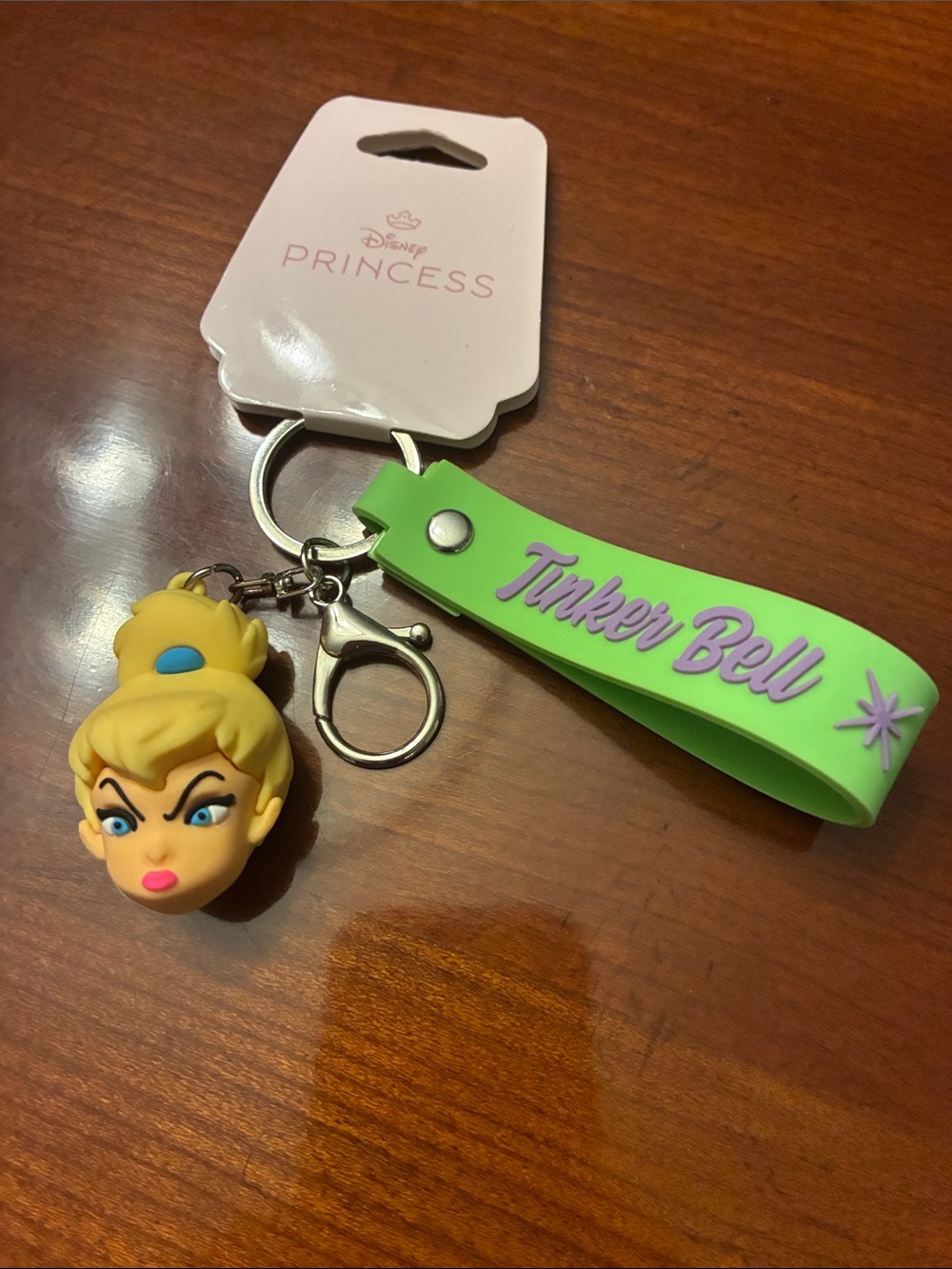 DISNEY. Tinker Bell Lime Green Silicone Key & Tinker Bell Charm. Brand new.